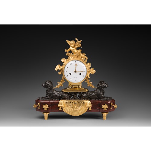 Louis XVI patinated and gilded bronze clock